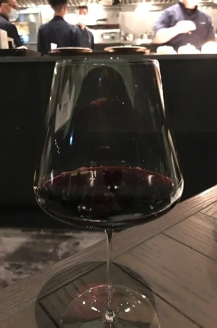 Ando glass of red wine.jpg