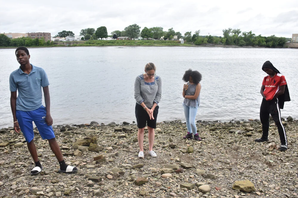 From left; Jarelle Summers, Darlene Hunter, Nicolena Russell and Donovan Wooten prepare to collect samples of water from the Hudson River in Troy, N.Y. on July 24, 2018. 