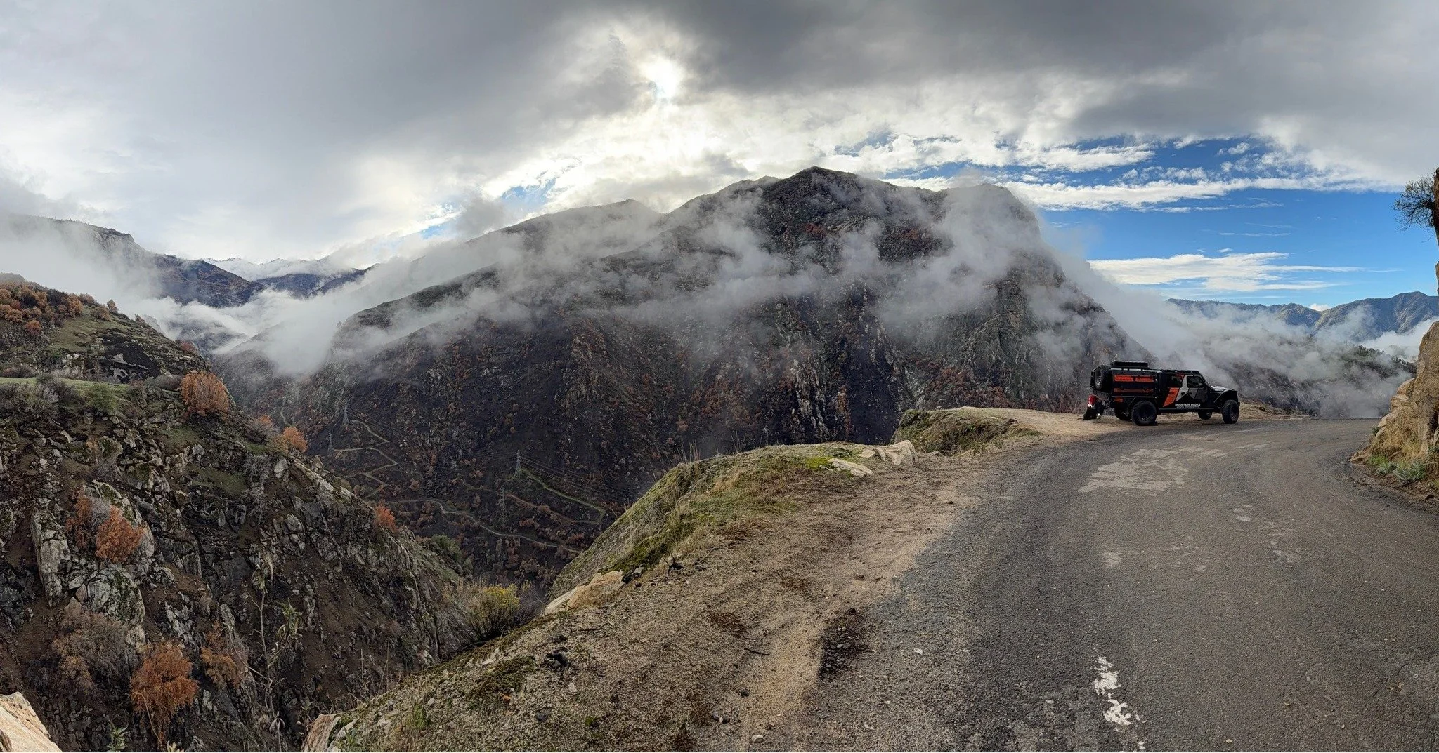 Out on the bridge repair assignment with the Jeep Gladiator&mdash;can&rsquo;t beat a work site with mountain views like this. 🏔️💪 

#JeepLife #OnTheJob #clouds #gladiator #explorepage #explore #cliff #paramedic #emt #roperescue #standymedical