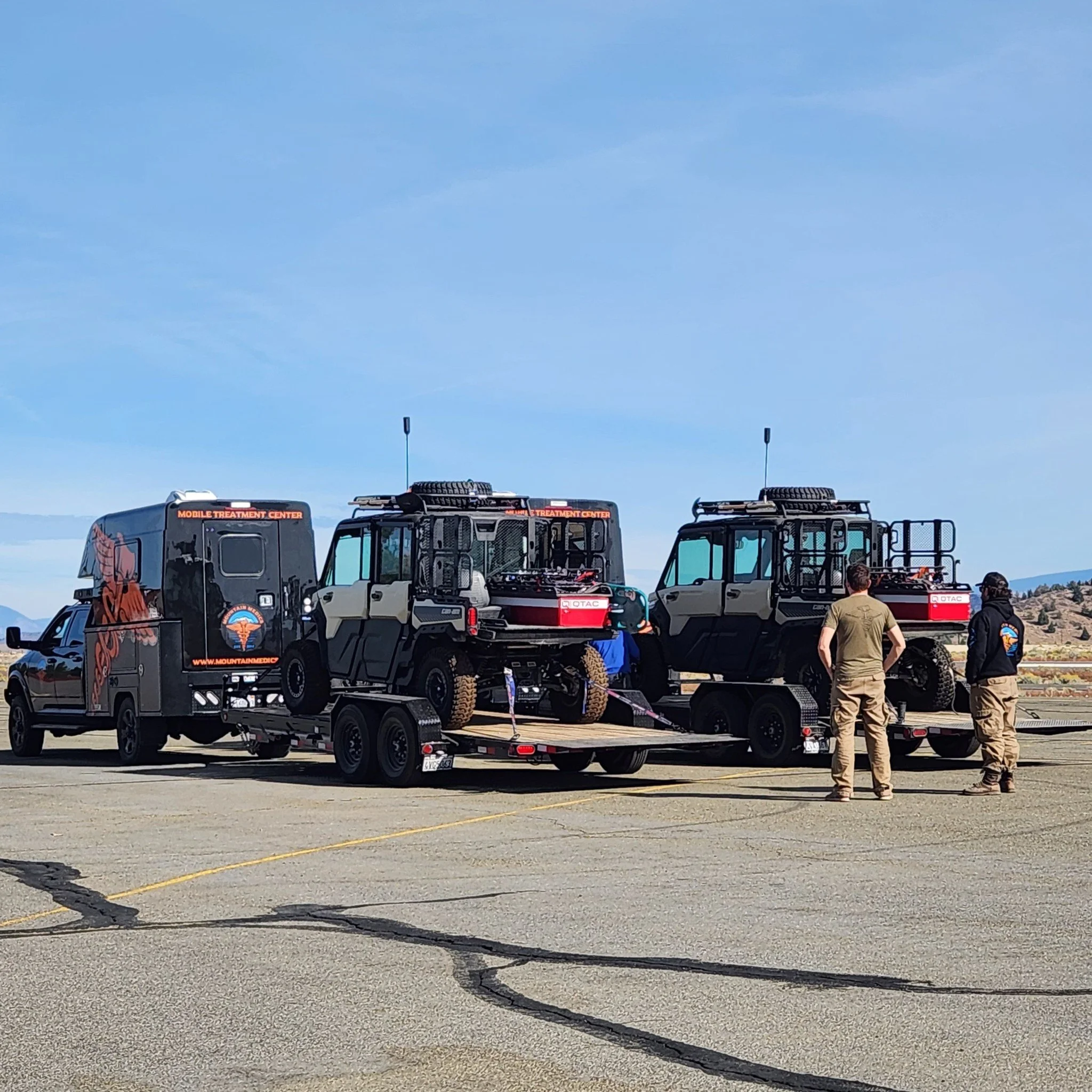 UTVs prepped and ready to go&mdash;built to tackle rough terrain so we can get further in and be closer to the action on the fireline. Alongside them, our MTC (Mobile Treatment Center), a specially designed cab-over unit with a fully built-in care ce