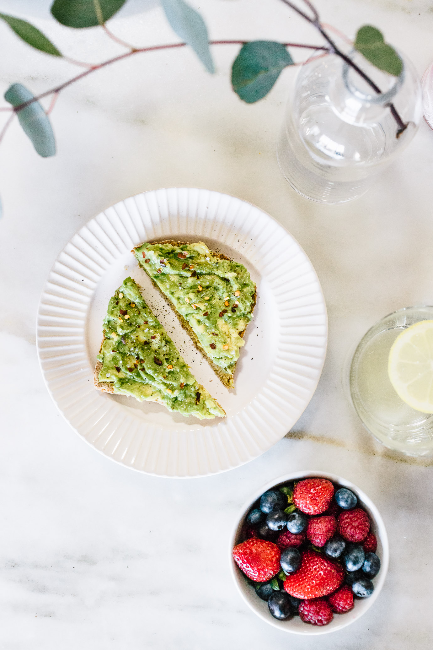 avocado toast with bowl of berries