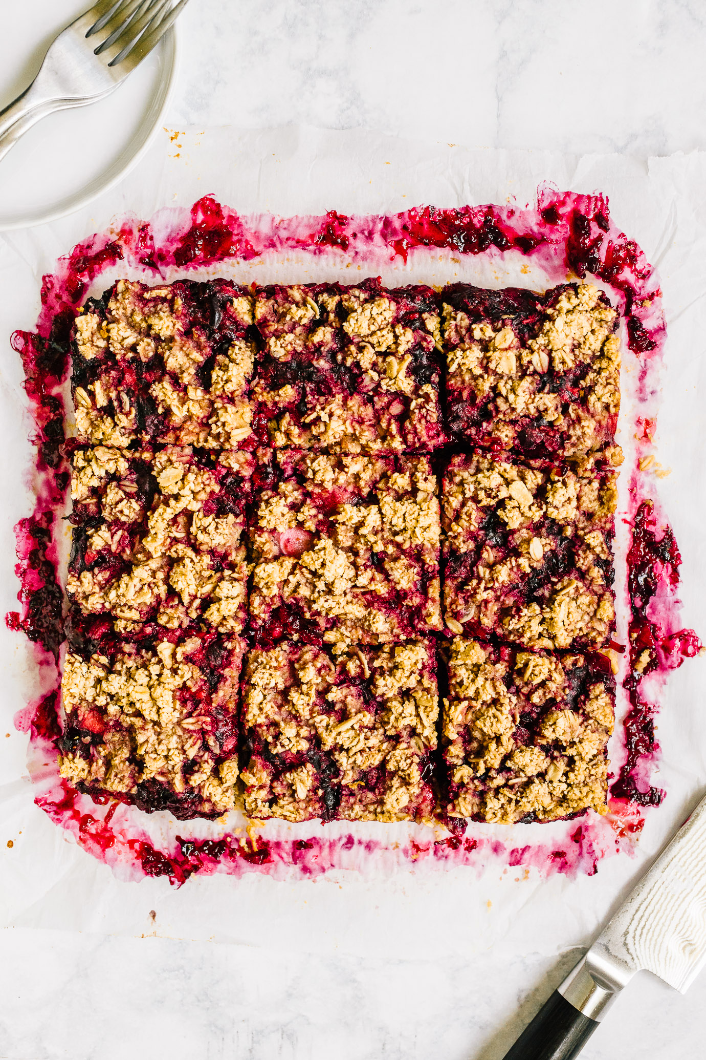 mixed berry crumble bars sliced into squares