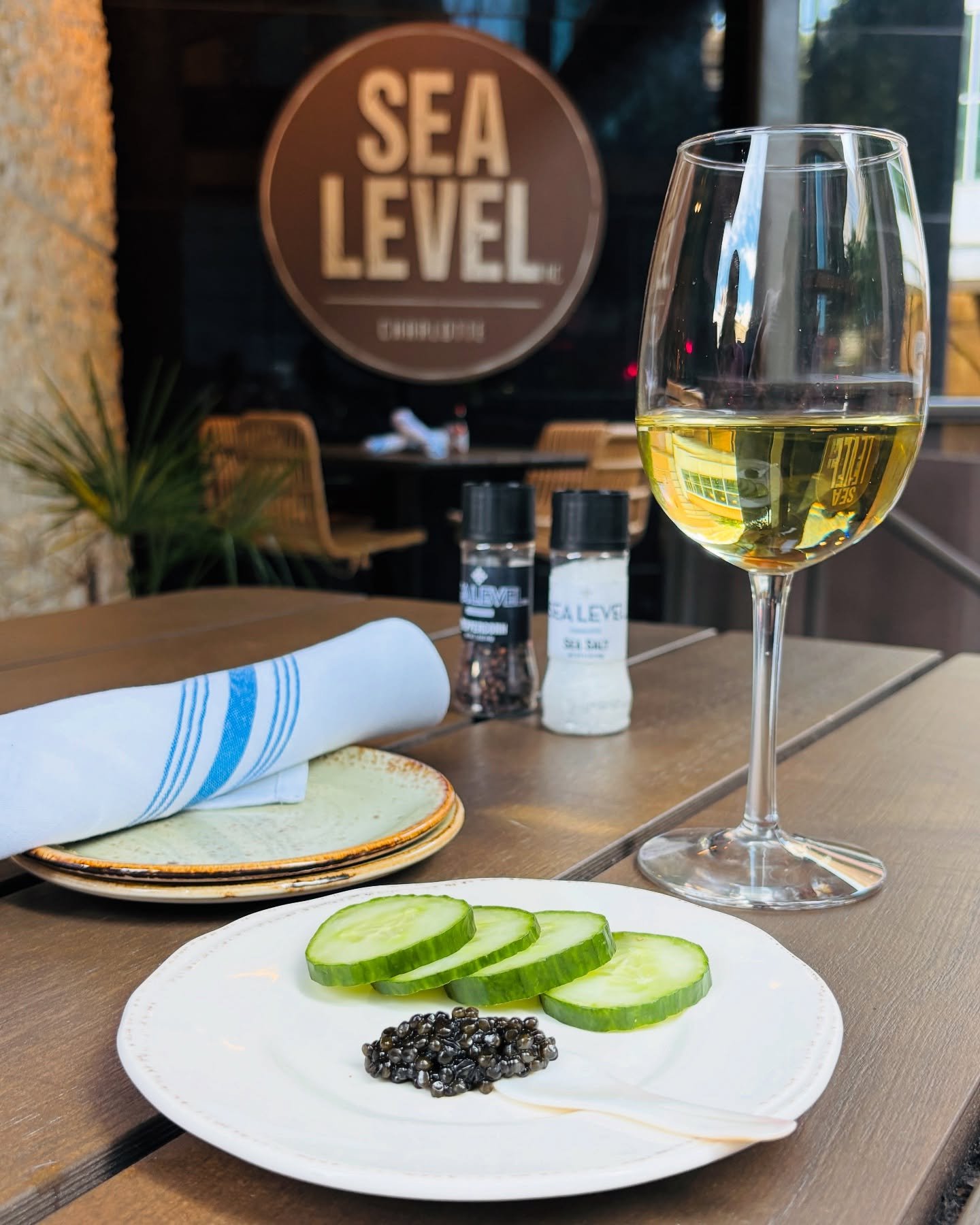 Local caviar is on deck &mdash; Black Sturgeon from @marshallbergfarm, cucumbers for crunch, and wine to keep it crisp. 🌊