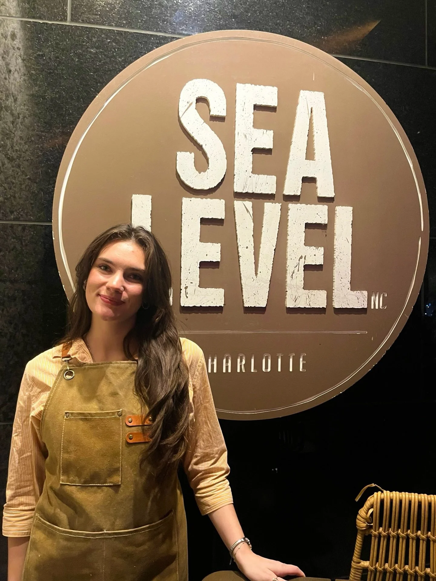 Originally from Pittsburgh, MacKenzie has been part of our Sea Level NC team since May &mdash; and even supported our Waterman crew in 2023! From hosting to barbacking to serving (and everything in between), she&rsquo;s truly a jack-of-all-trades whe