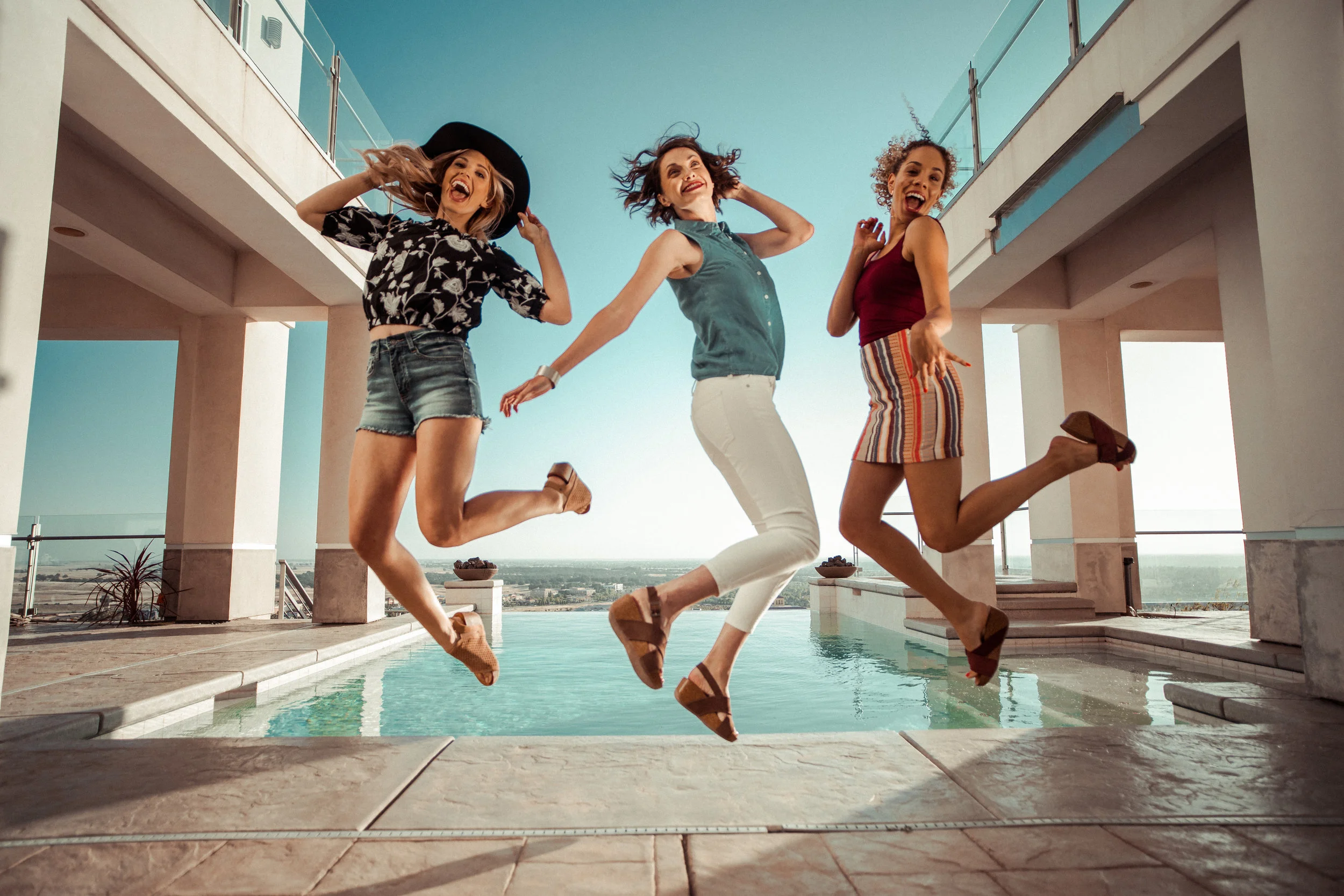 girls pool jump.jpg