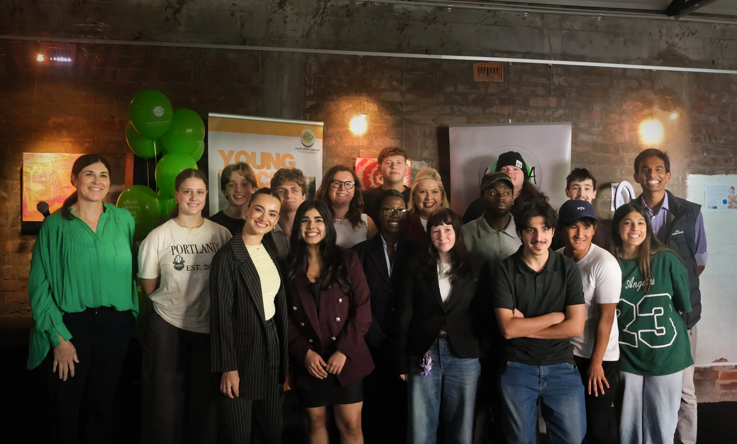 Group photo including young people involved in showcase, YACSA CEO and President and Hon Katrine Hildyard MP