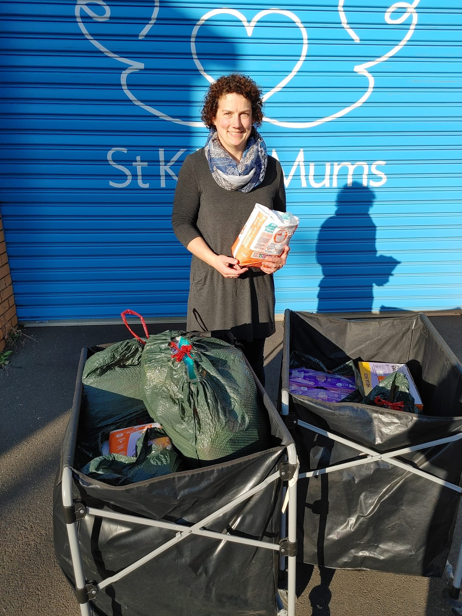 Volunteer Lierin dropping nappies to St Kilda Mums May 2022.jpg