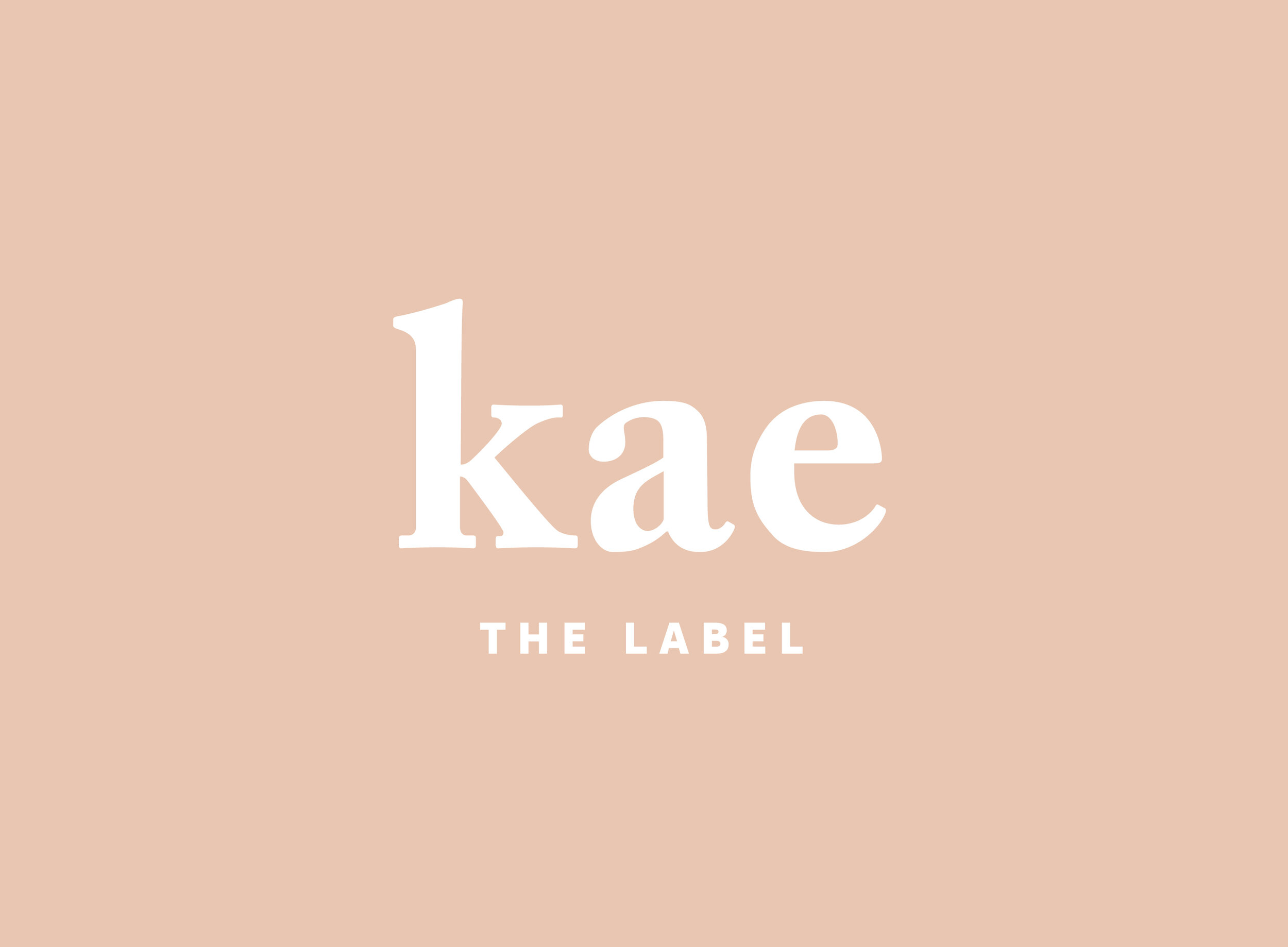 kae the label primary logo white on pink-01.jpg