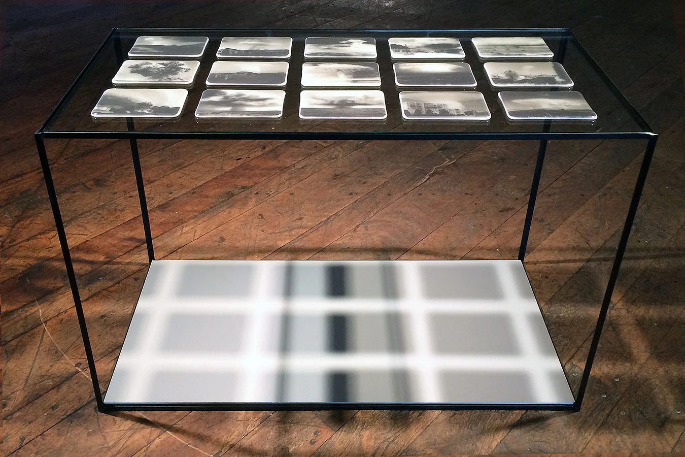 CLOUD STUDIES II, 15 fused glass postcards each 4" x 6", glass and steel base 40"h x 40 1/2"w x 18 1/2"d 2016