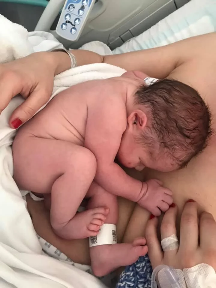 IN THIS PHOTO HE IS 15-MINUTES OLD. STILL IN THE FOETUS POSITION ON THE OUTIDE.