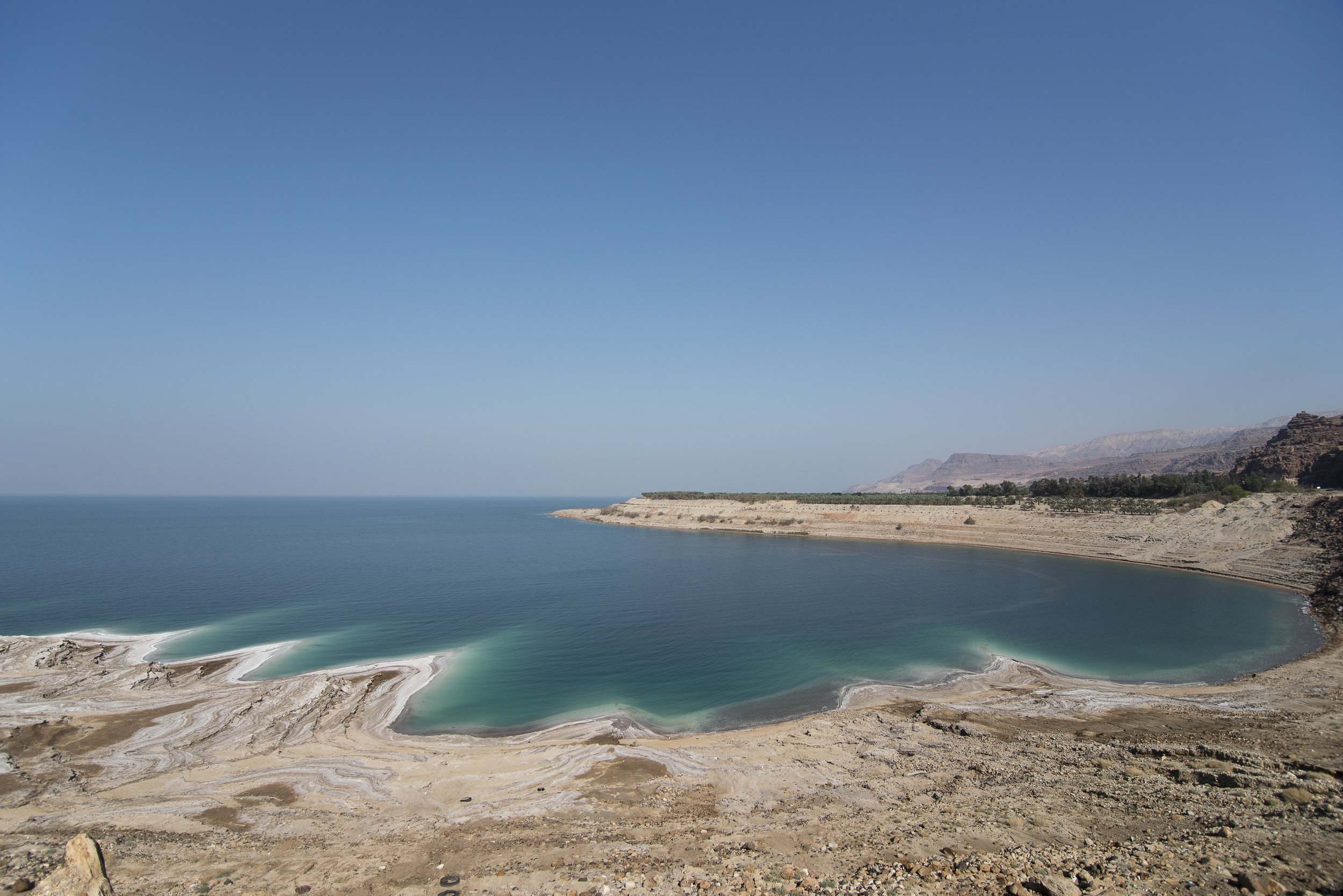 A portion of the Dead Sea near Jordan’s border with Israel shows signs of the shoreline’s vast recession