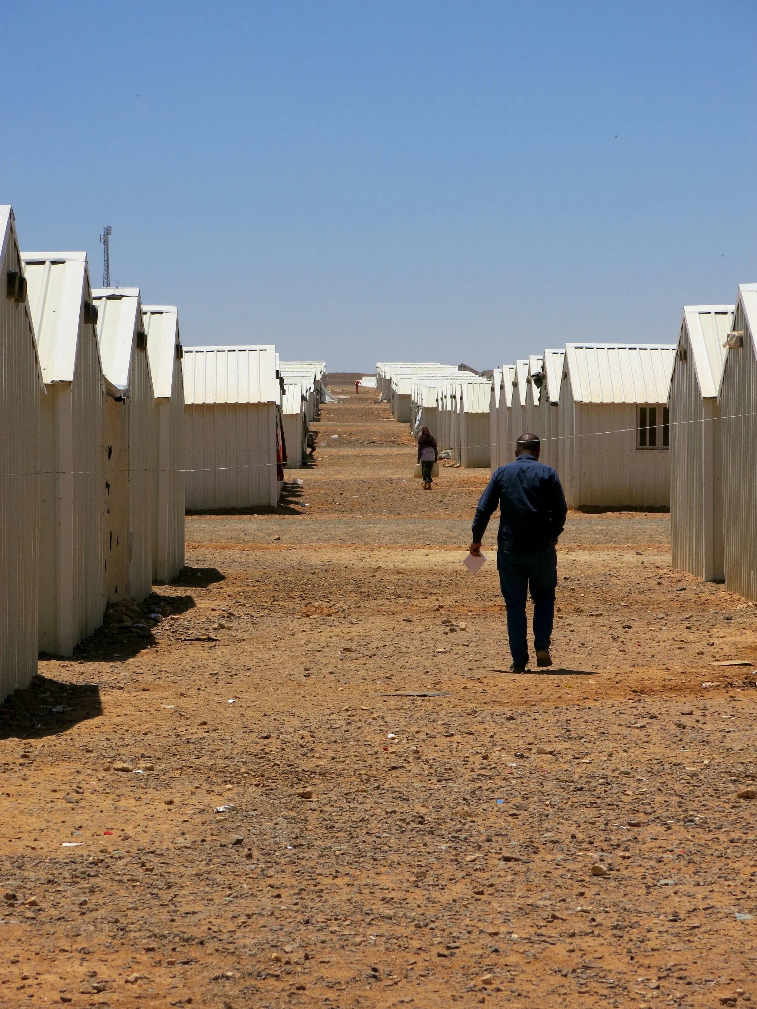 Stakeholders sign milestone document to include Syrian refugees .jpg