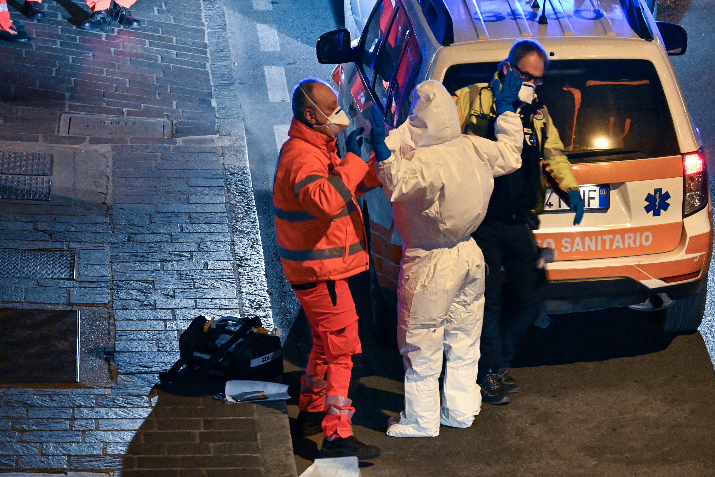  Medics are seen working on the streets of Casalpusterlengo, one of the towns currently on coronavirus lockdown in northern Italy on February 23. Photo by Michele Lori. 
