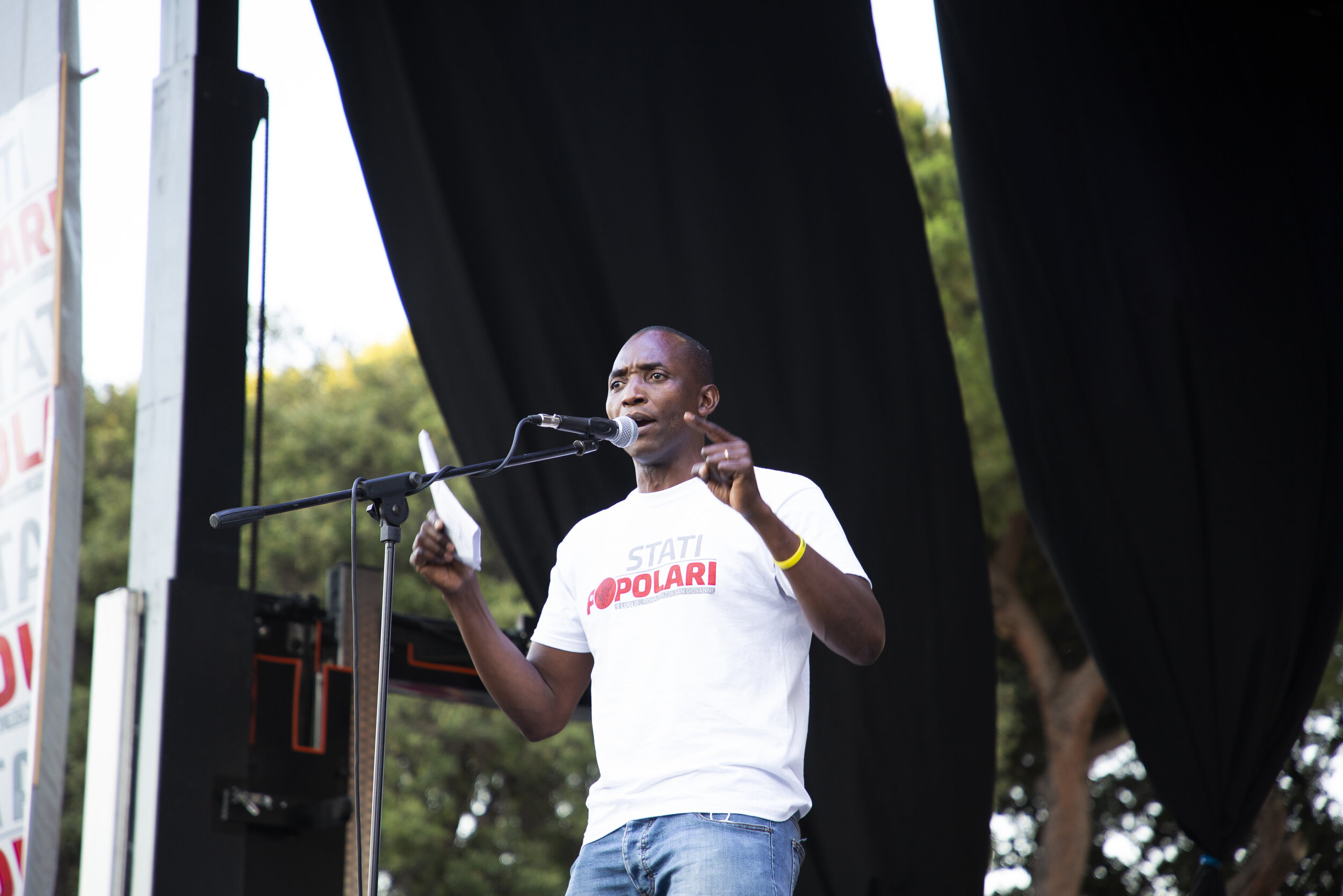  Italian-Ivorian trade-unionist and campaigner Aboubakar Soumahoro is seen addressing an audience in Rome on July 5, 2020. He says the current regularization provision is a failure under any possible aspect.  