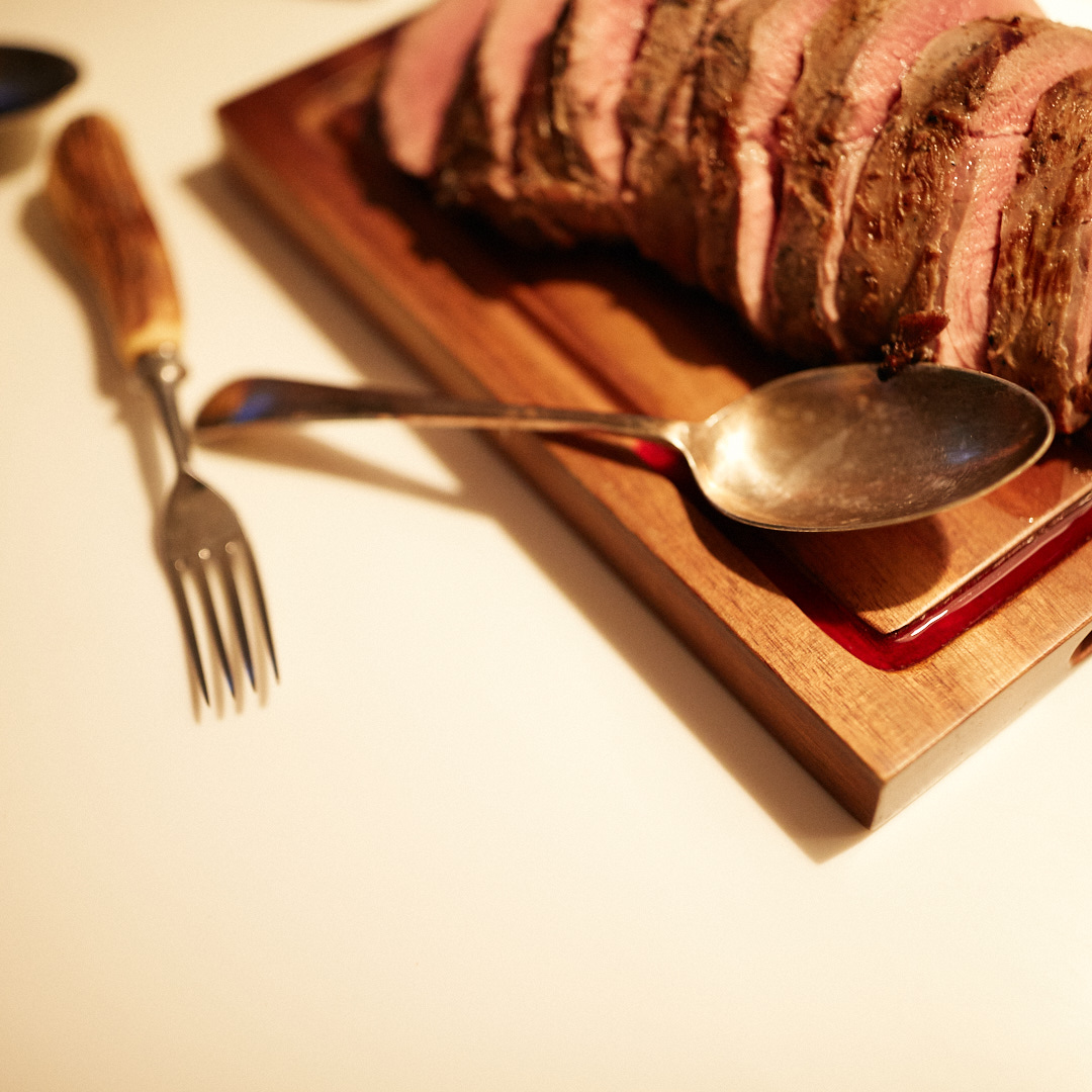 Carved muntjac and cutlery.jpg