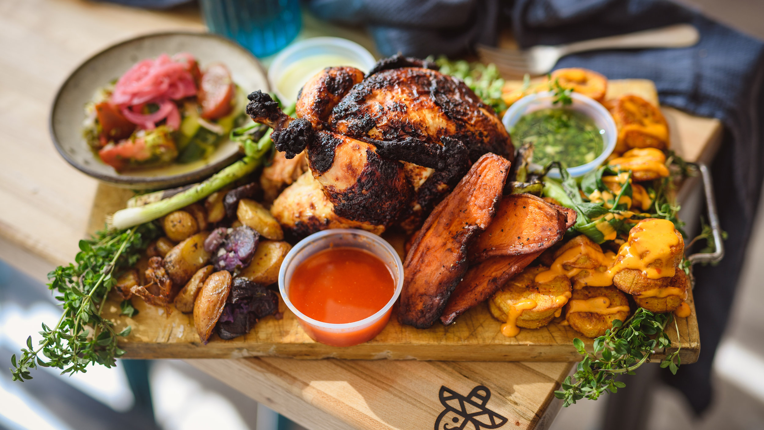 Authentic Mexican flavors at El Pollo Guapo, featuring flavorful tacos and creamy elote.
