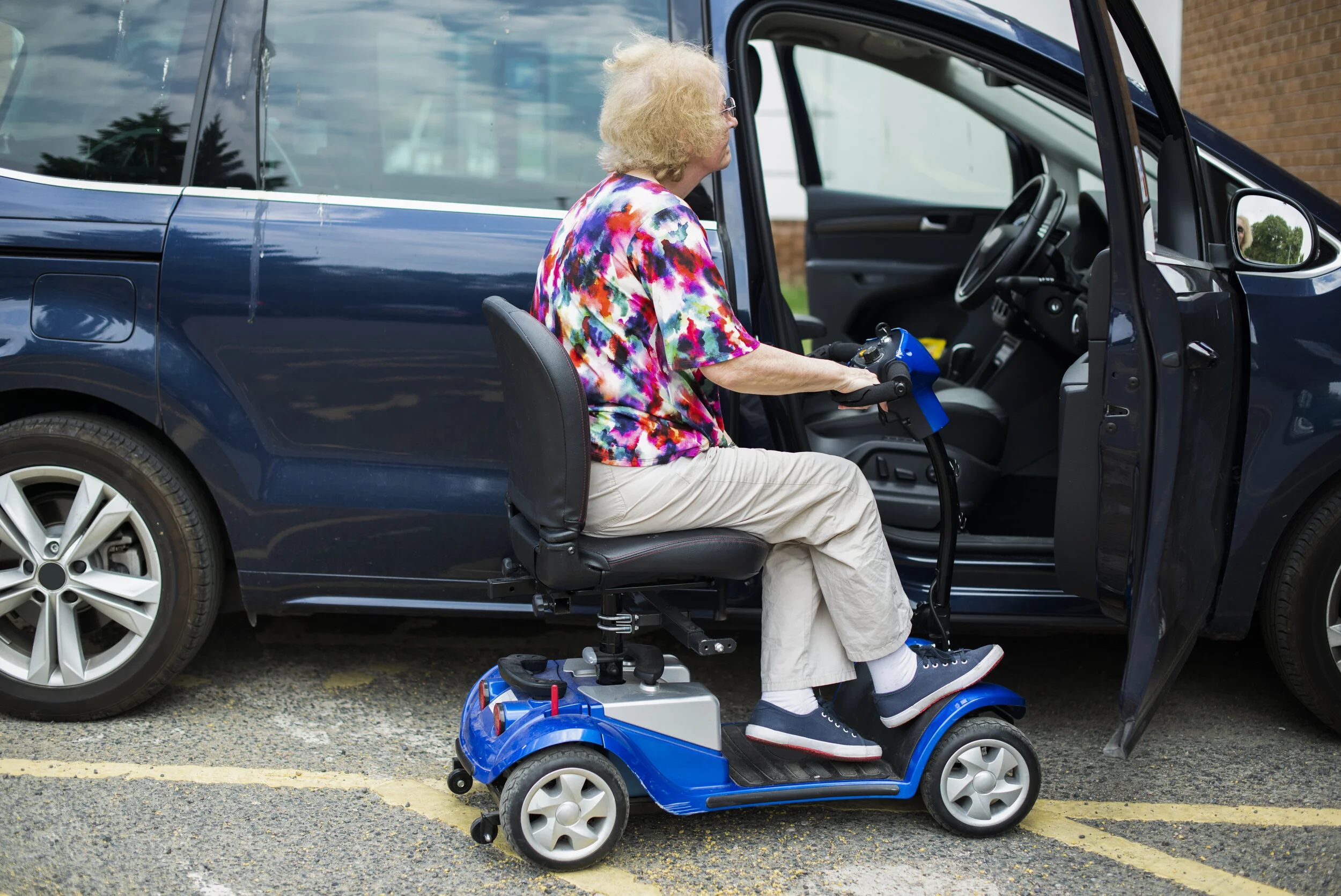 Senior woman on an electric wheelchair