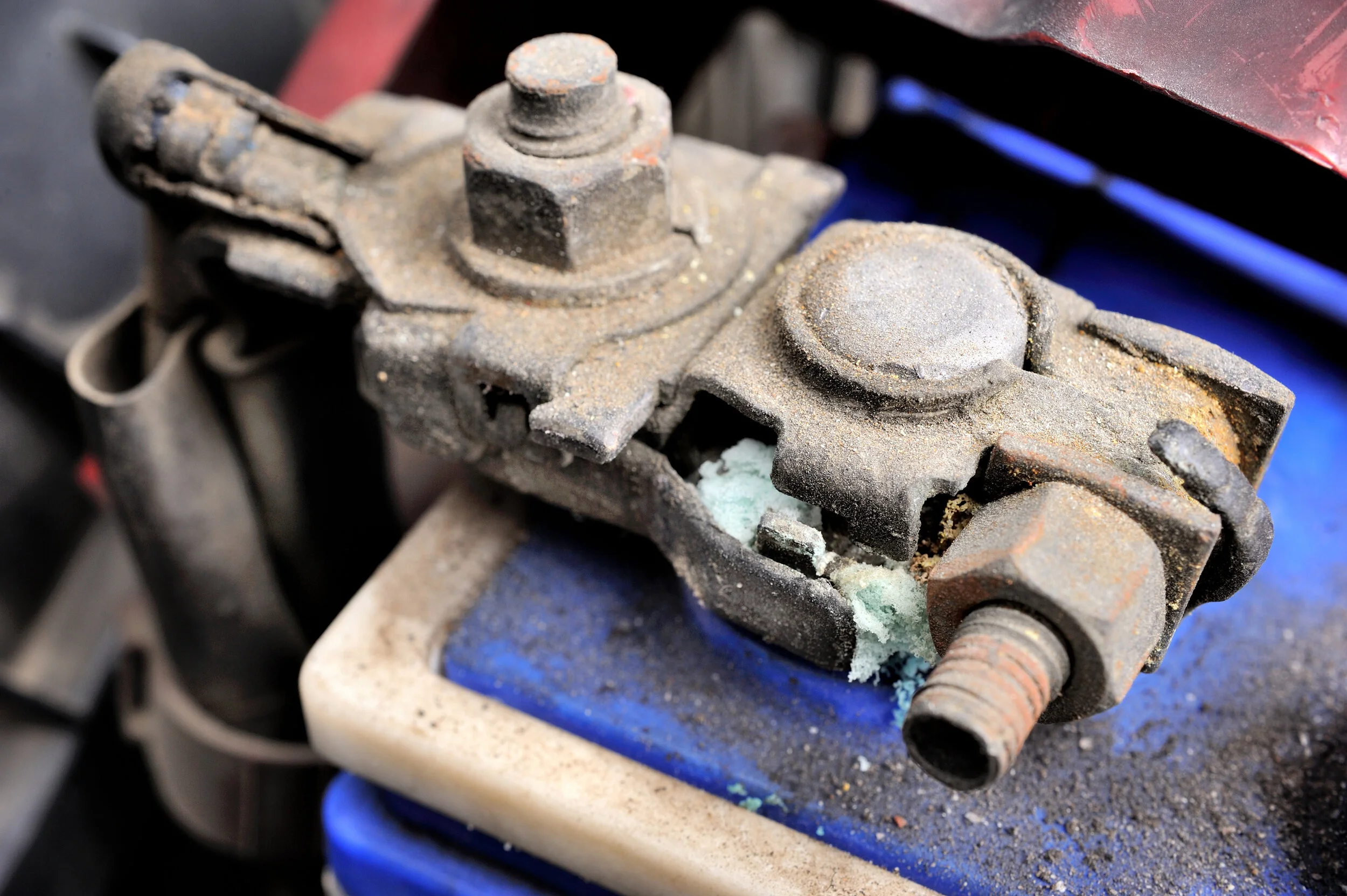 If your car battery has corrosion, you may want to spray battery cleaner or use vinegar before trying to remove the cable.
