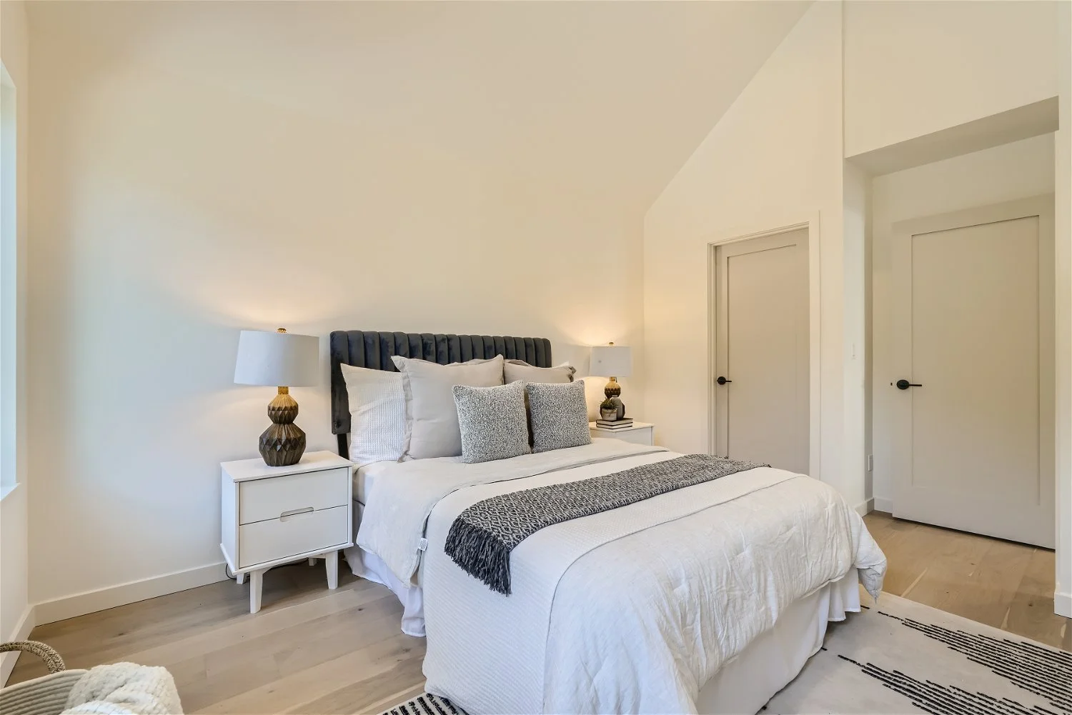 7029B 25th Ave NW - Web Quality - 017 - 22 2nd Floor Primary Bedroom.jpg