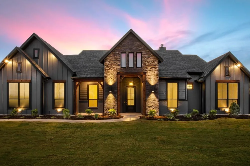 Home exterior lighting at dusk showing curb appeal and property value improvements