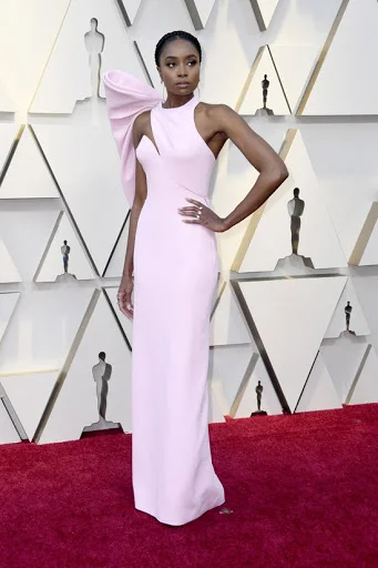 If Beale Street Could Talk actress, Kiki Layne in a custom Atelier Versace column gown paired with Swarovski jewelry.