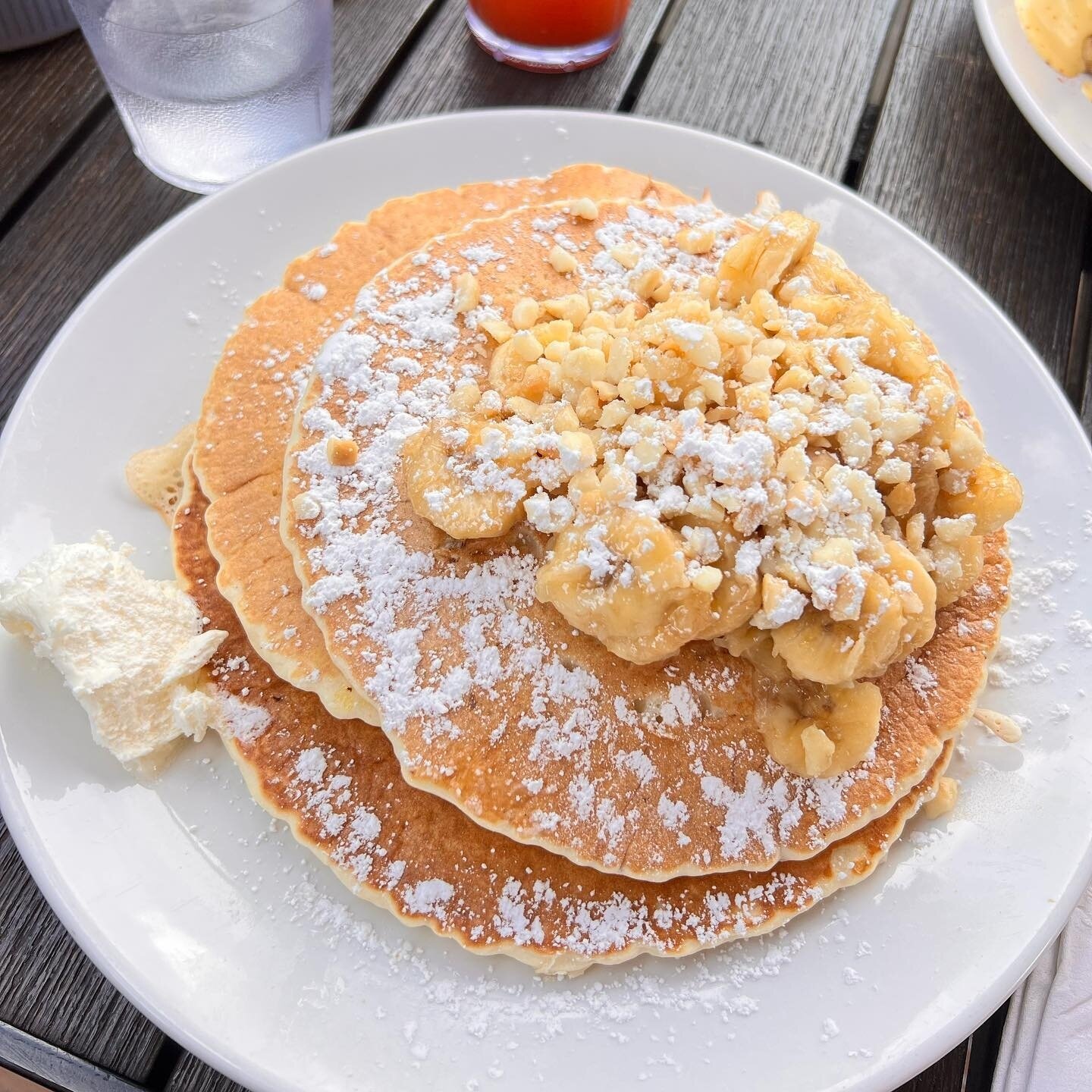 Mahalo again @liz.the.dfw.foodie for another awesome shot! We love seeing your food tags and mini reviews so make sure to hit us with that @! ⁠
⁠
&quot;Banana macadamia nut pancakes with coconut cream from kiheicaffe.lahaina kiheicaffe 😍🤤 &quot;⁠