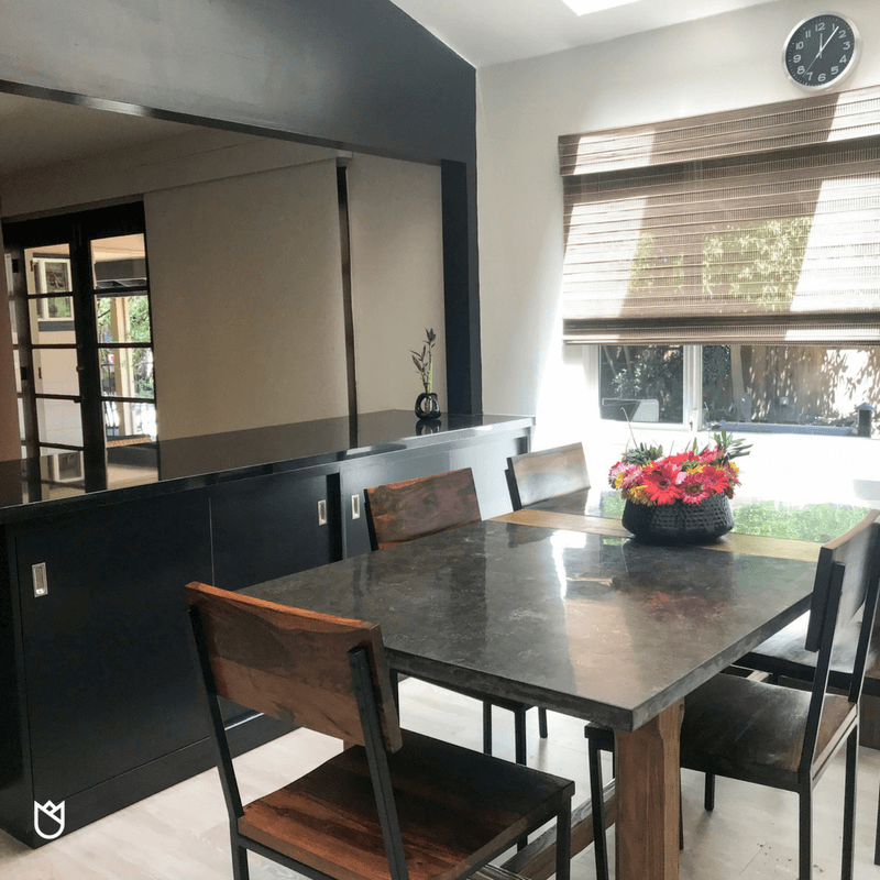 The 80s whimsical wallpaper had to go. We painted the walls our favorite Sherwin Williams White Duck and added a black accent wall to highlight the vaulted ceiling