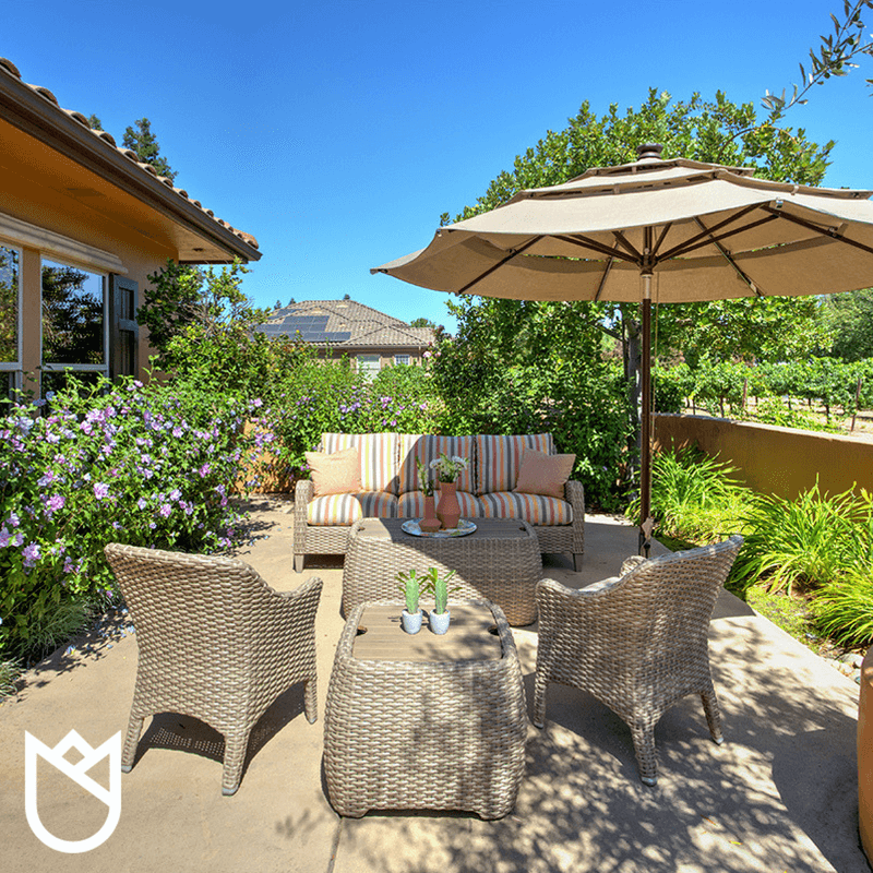 We-opted-for-an-outdoor-loveseat-instead-of-a-sofa-and-faced-it-west-so-our-clients-could-catch-the-gorgeous-view-of-a-California-sunset.png