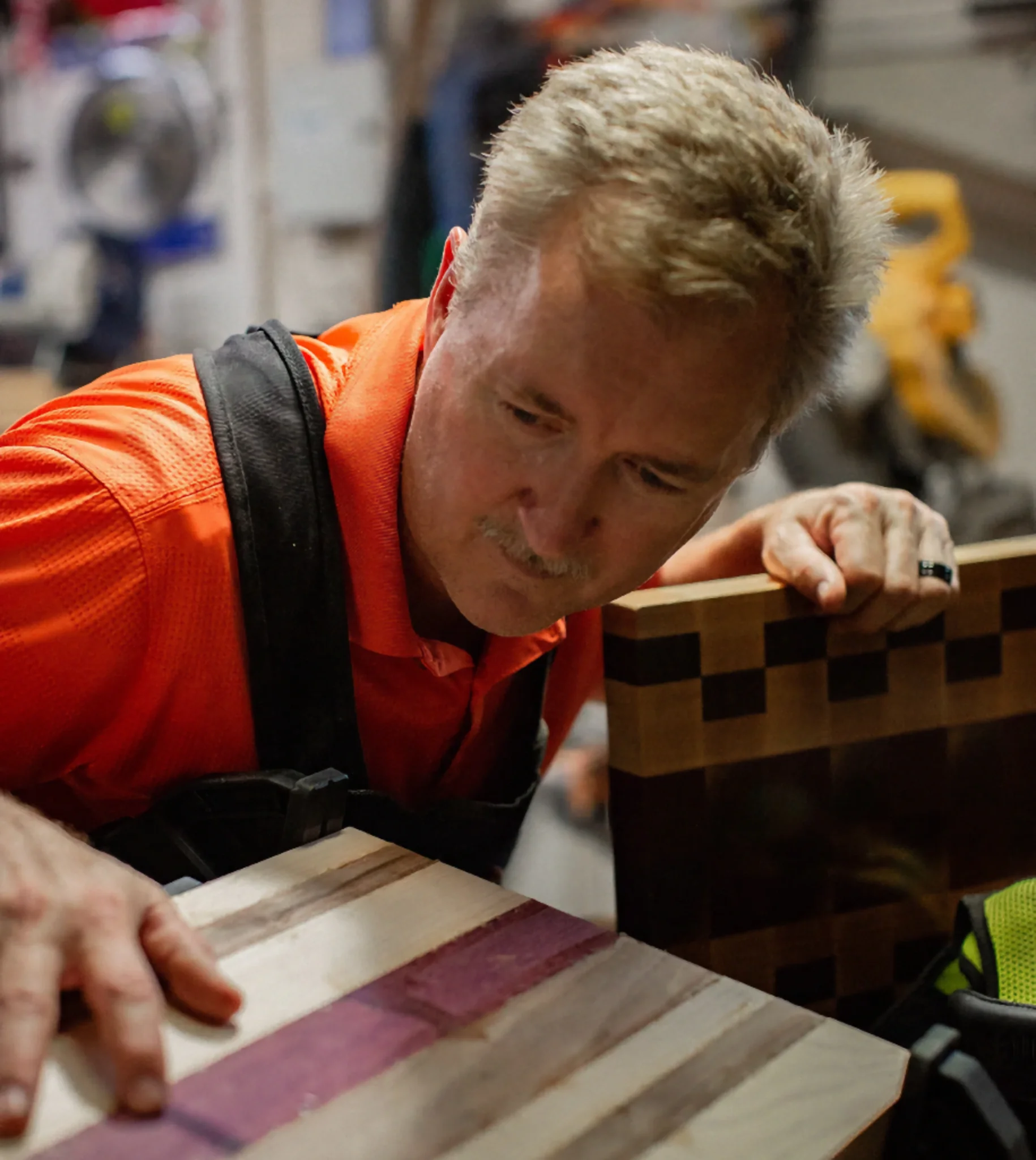Kevin Heard, founder of KRH Woodworking working on luxury cutting boards in his shop.