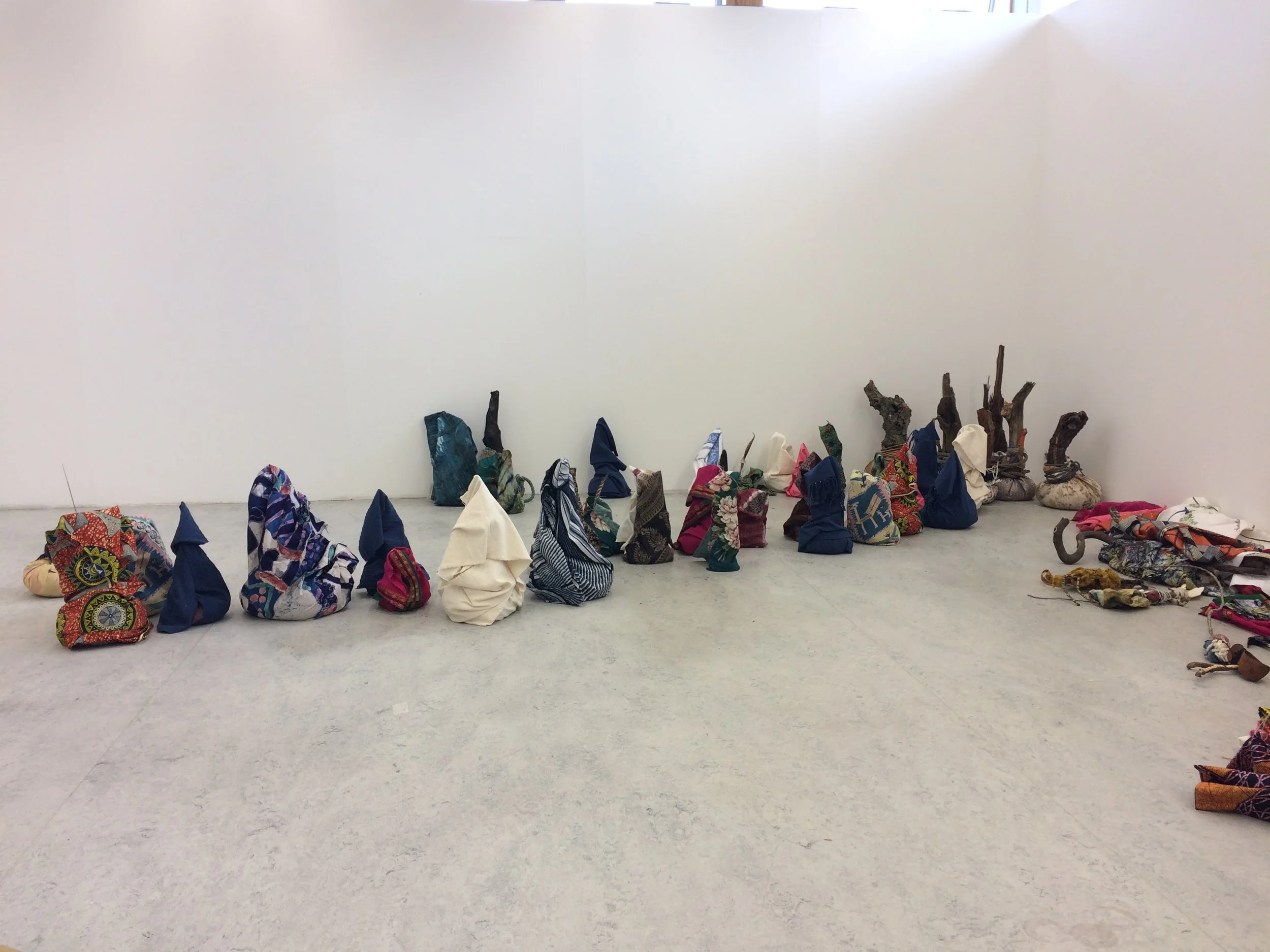 Offerings (earth), 2018 floor installation, dimensions variable 