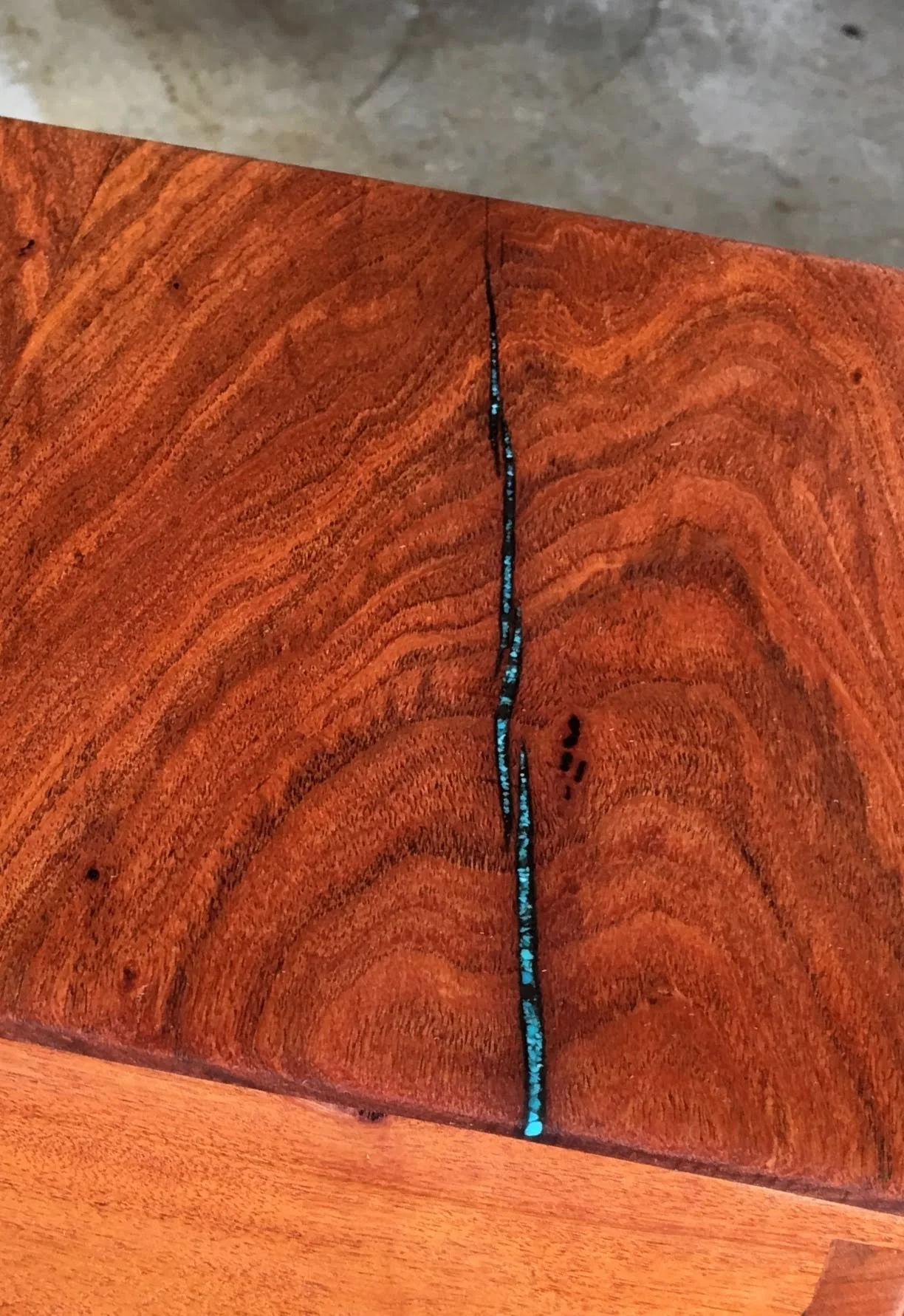 Closeup of the turquoise inlay