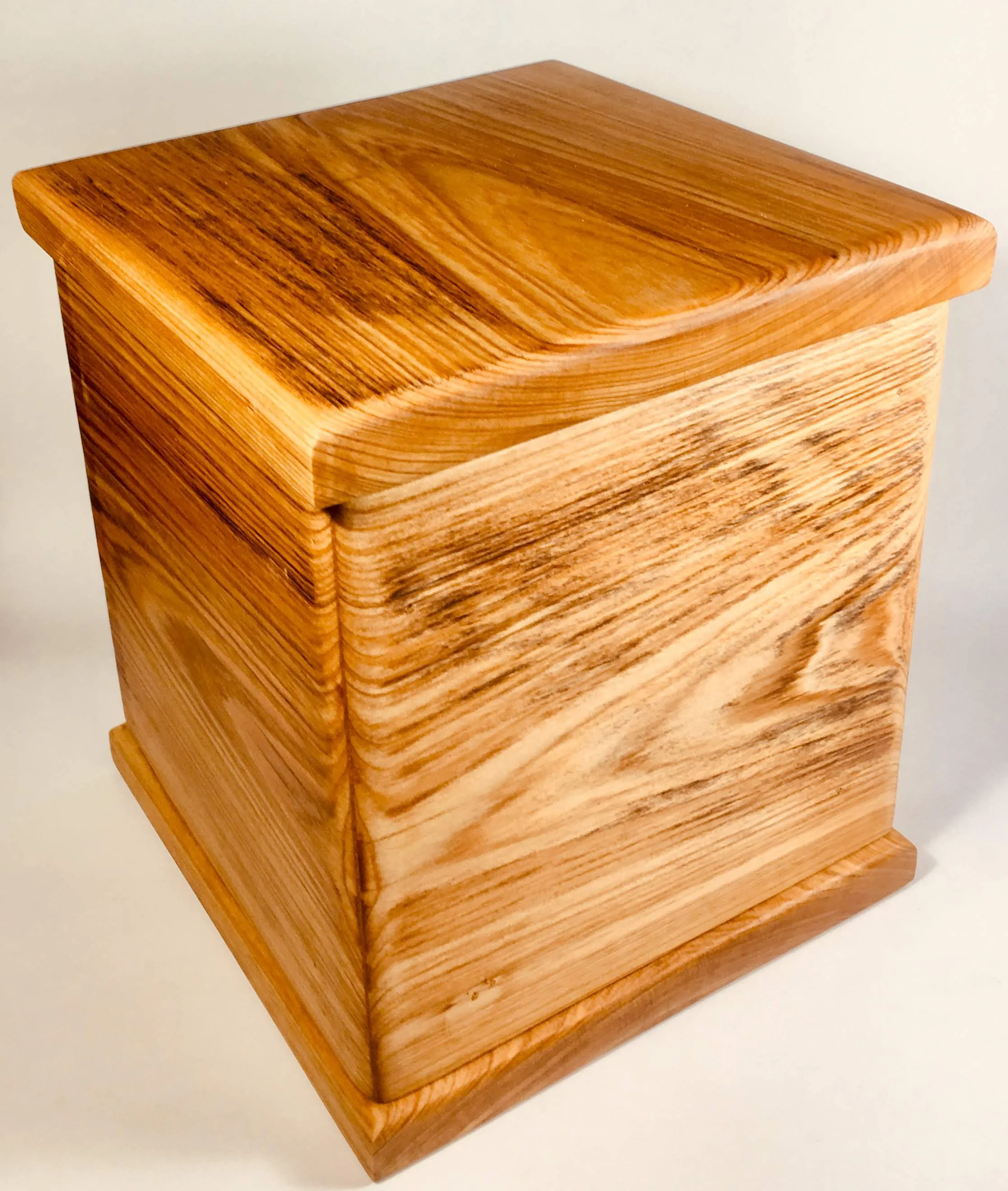  Another small box built by a good friend Jim Stafford.  This is a little larger urn done in sinker cypress. 