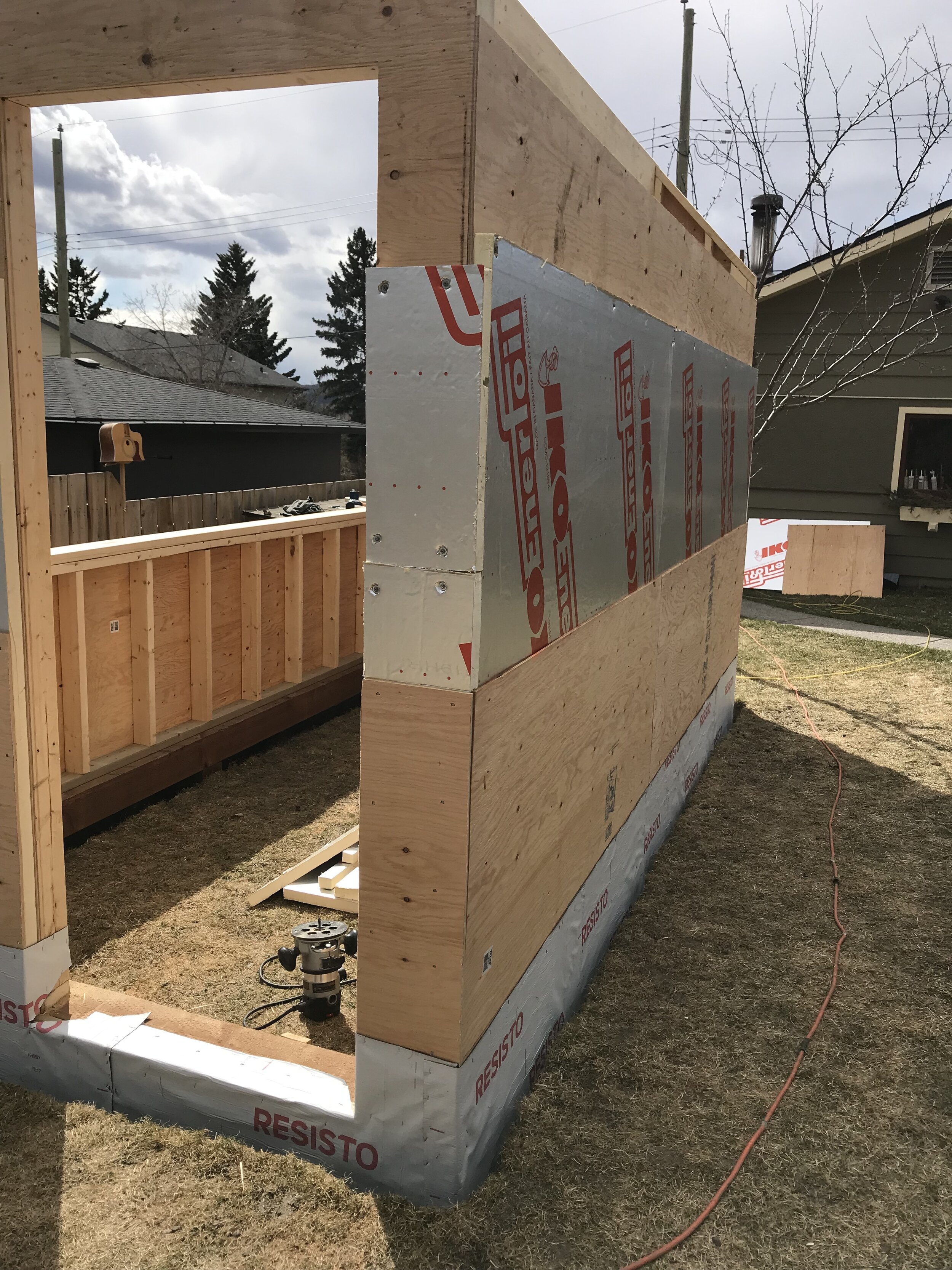 Exterior layers: plywood, insulation, plywood (+ foundation membrane)