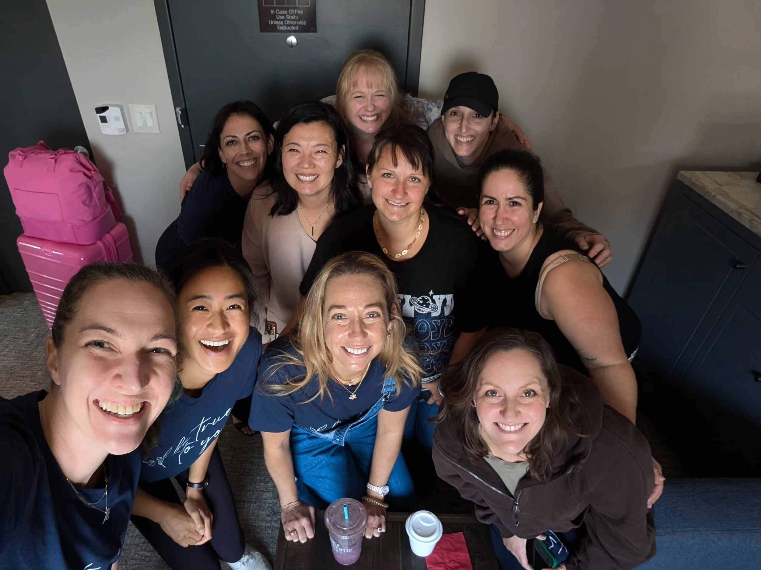 group of adhd moms smiling at a girls weekend trip