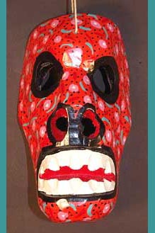 Red carved wood skull mask, view 1