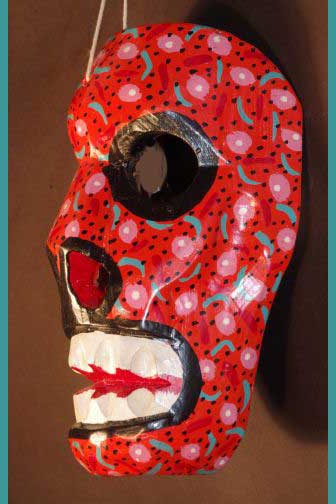 Red carved wood skull mask, view 3