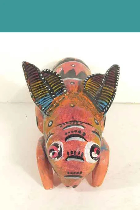 Wooden cricket rattle, view 1
