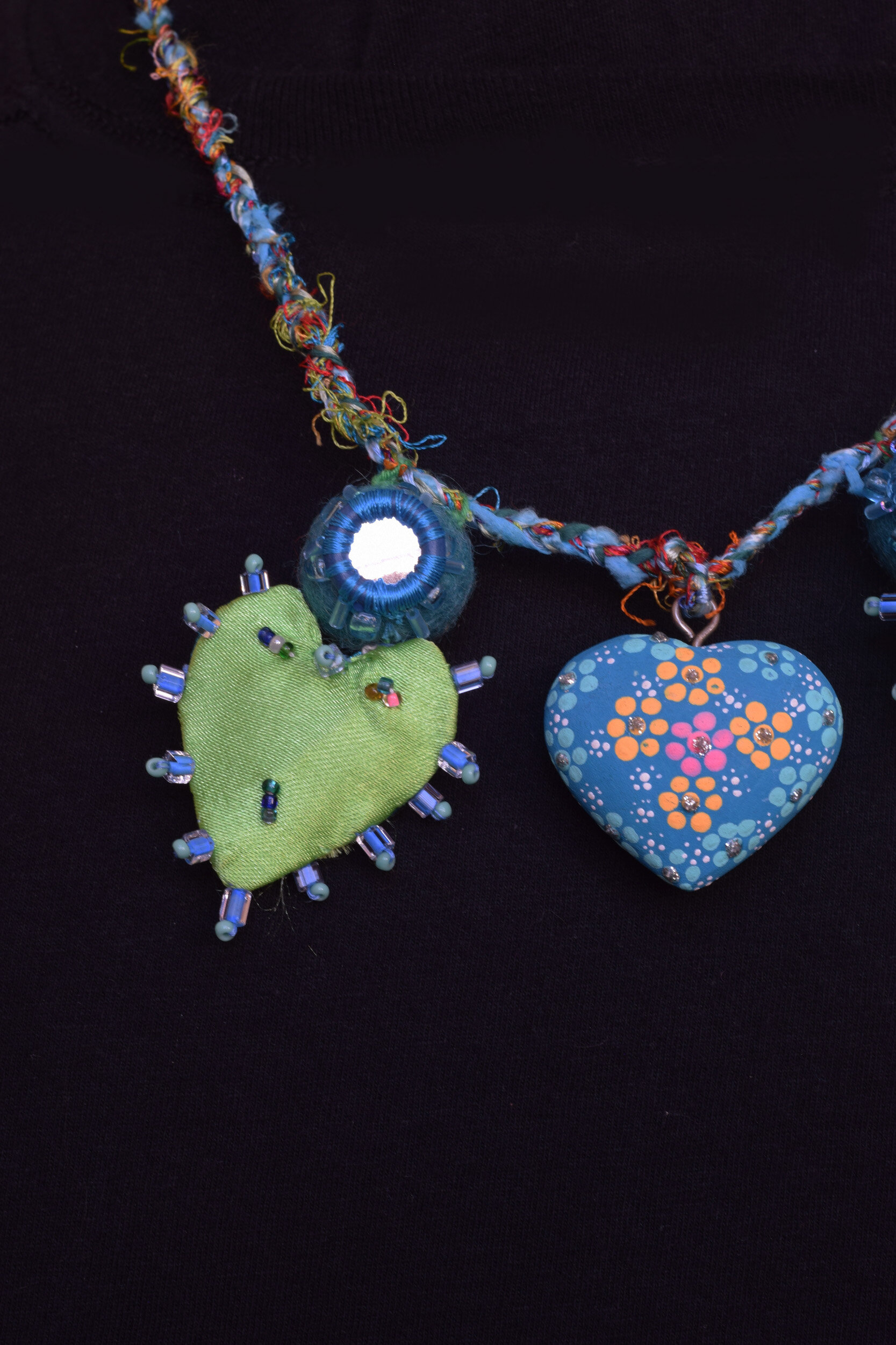 Blu&grn3hrtnecklaceclose1web.jpg