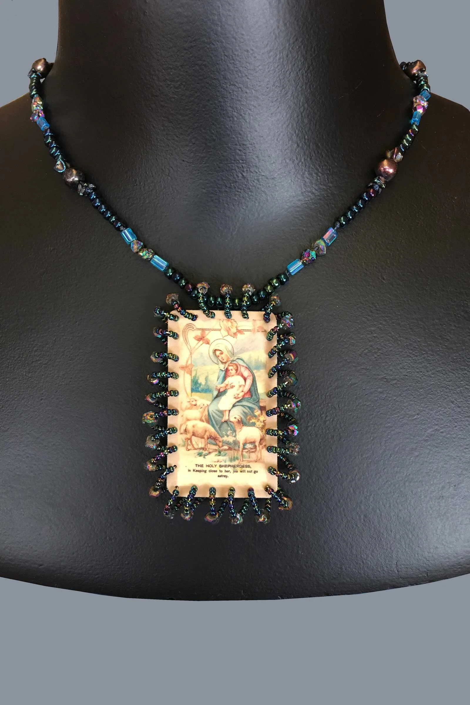 Necklace with image of Mary and Jesus