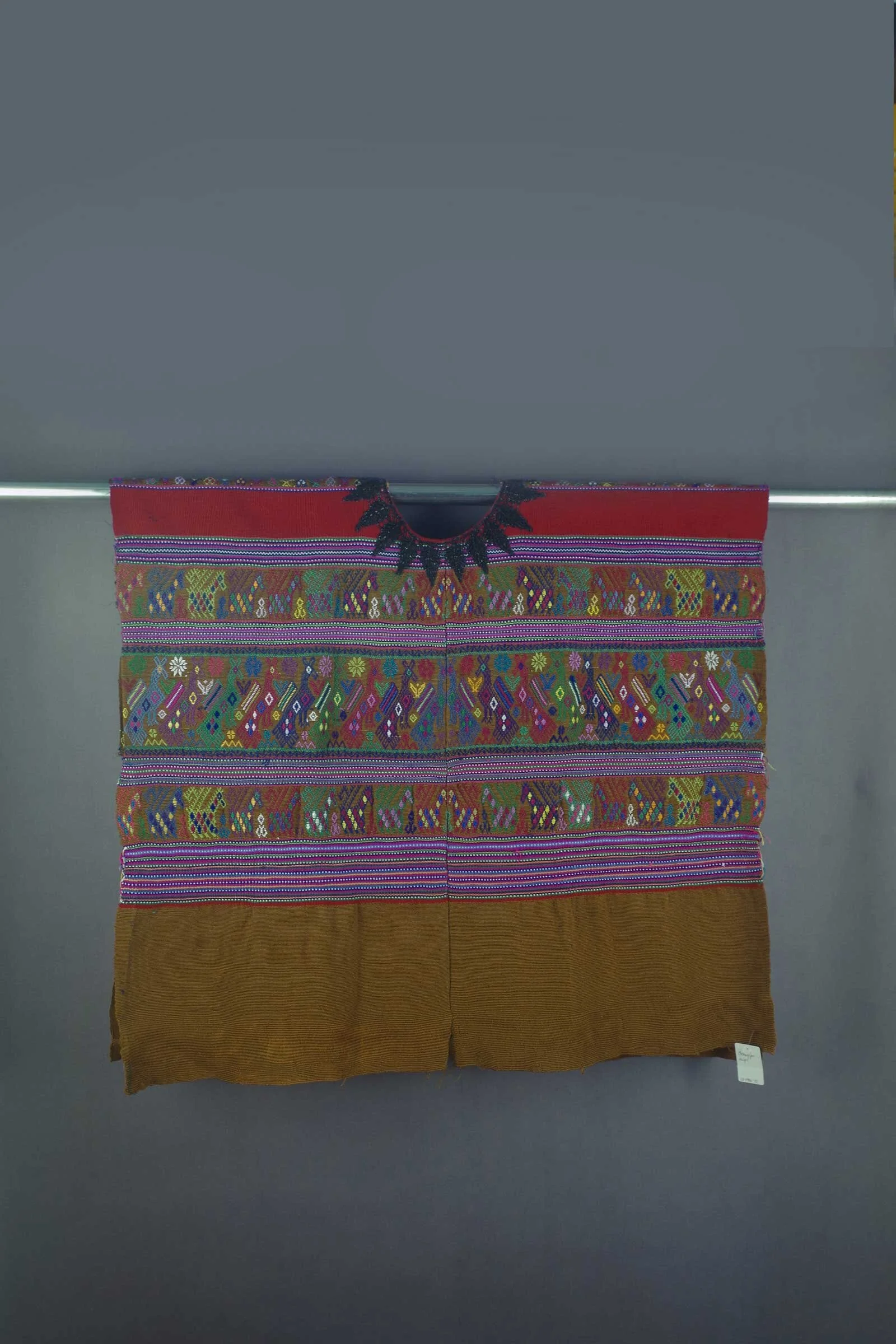 Comalapa huipile with brown ground