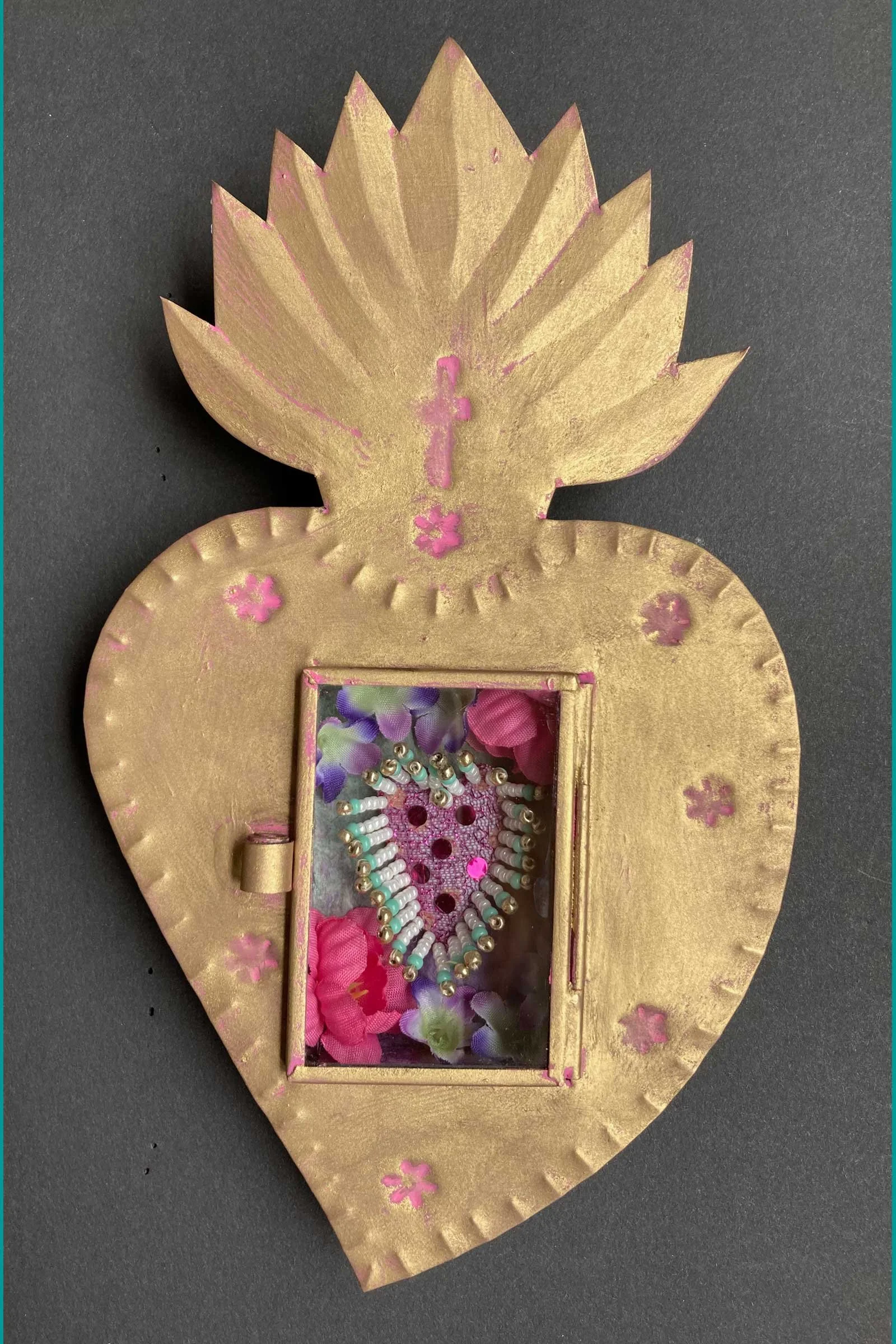Beaded purple heart in tin nicho
