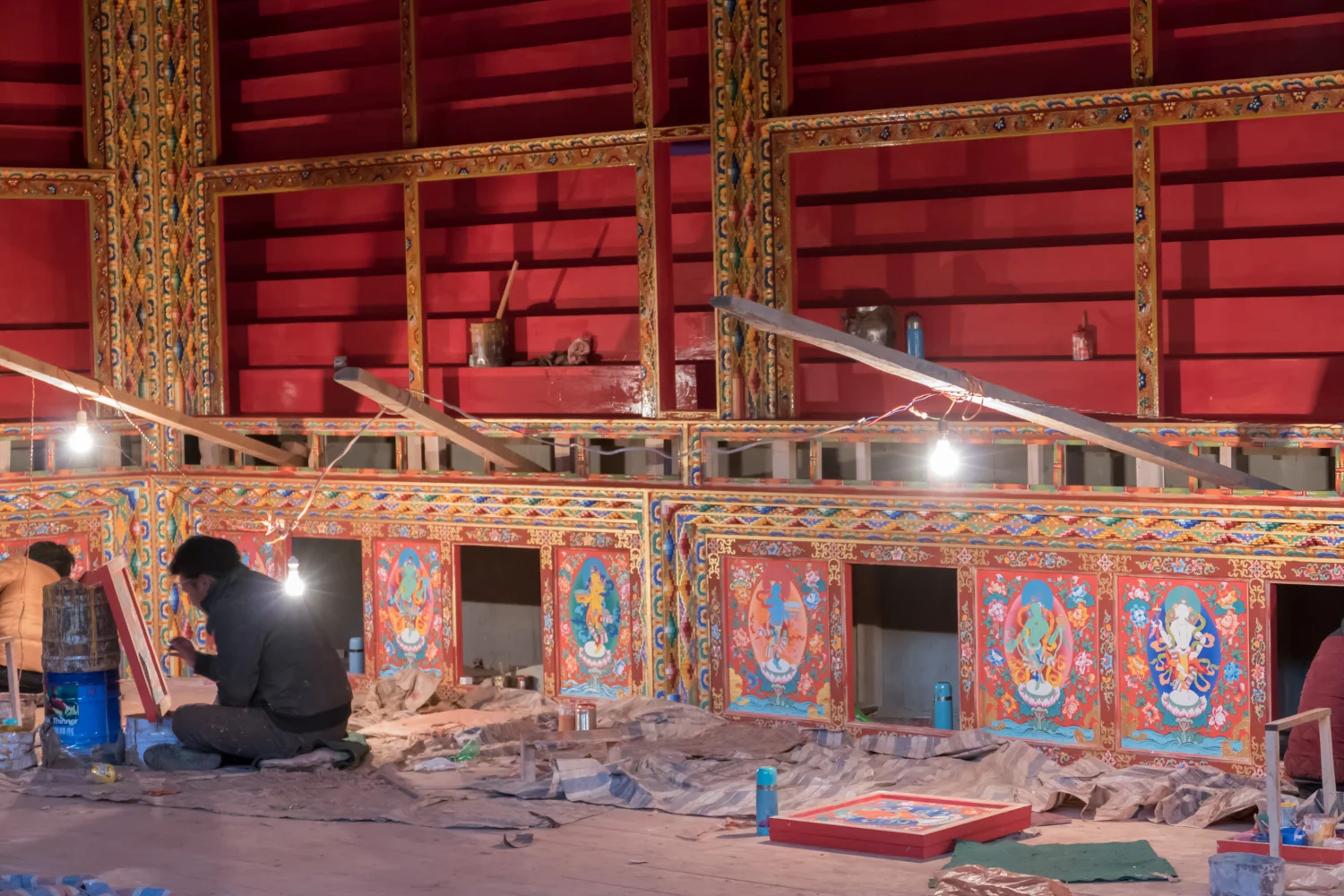 Workers painting the monastery