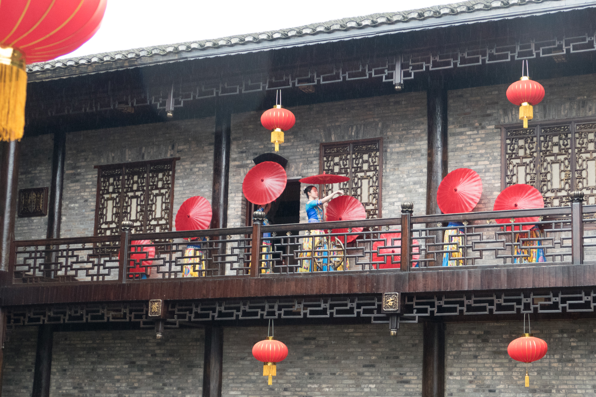 An umbrella dance at one of the historic houses