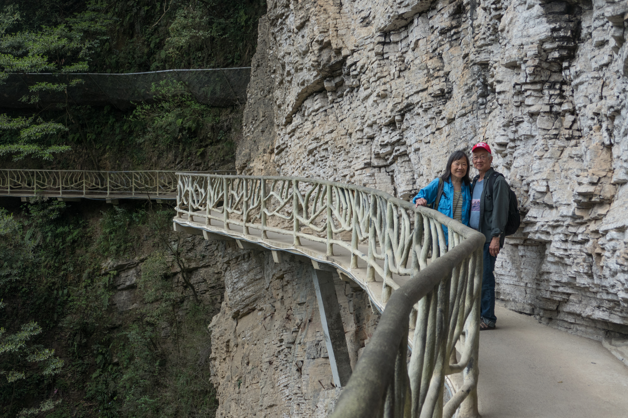 On a cliffwalk by the waterfall