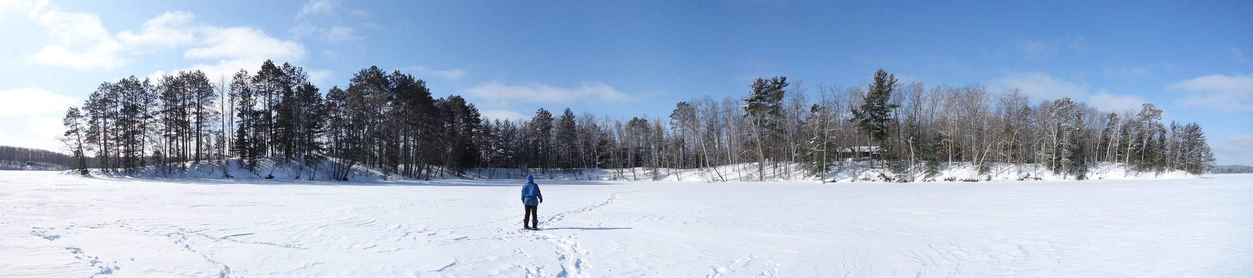Panoramic view of the island from the north in the winter. The cabin is visible through the trees to the right of center