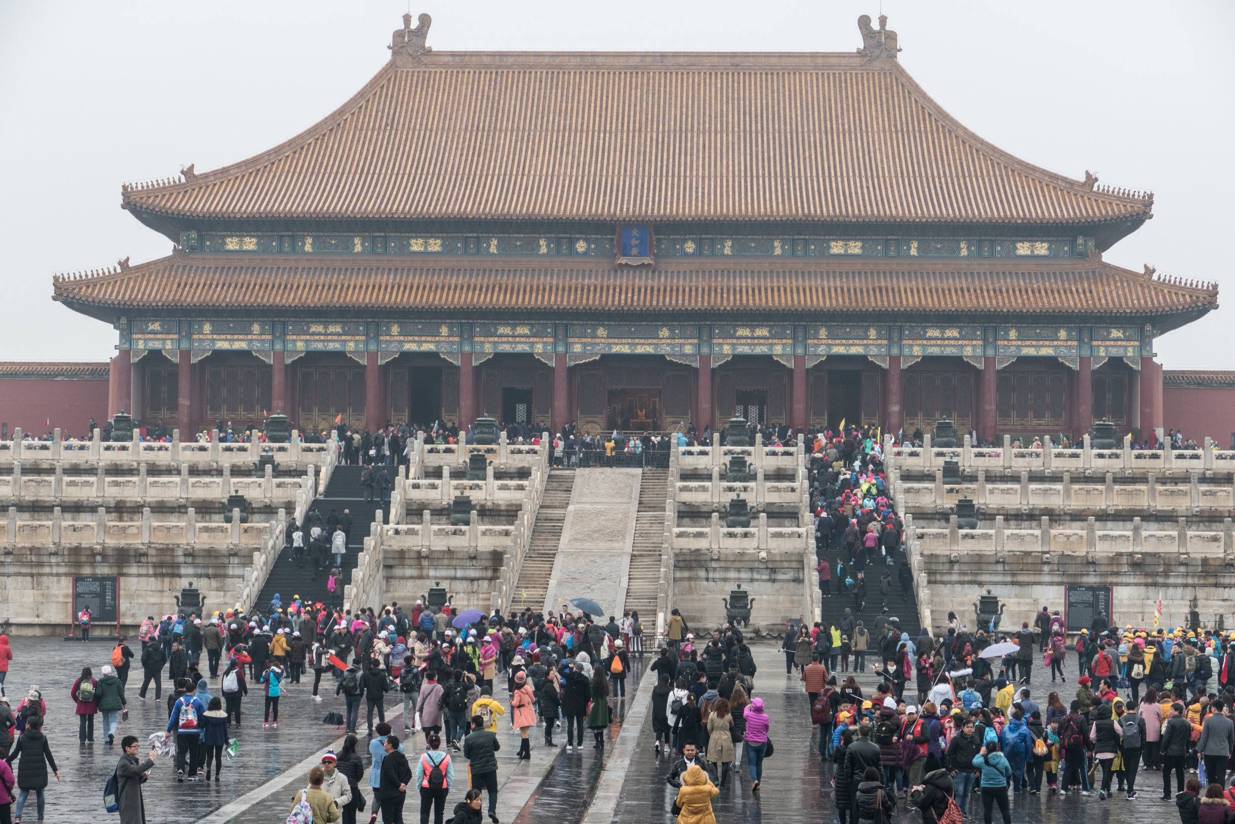 Despite the rain, there were large crowds at the Forbidden City