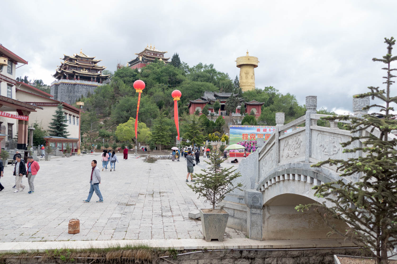 View from the city center of Guishan Temple and Zhuangjing Tong Prayer Wheel, the tallest one in the world on the right