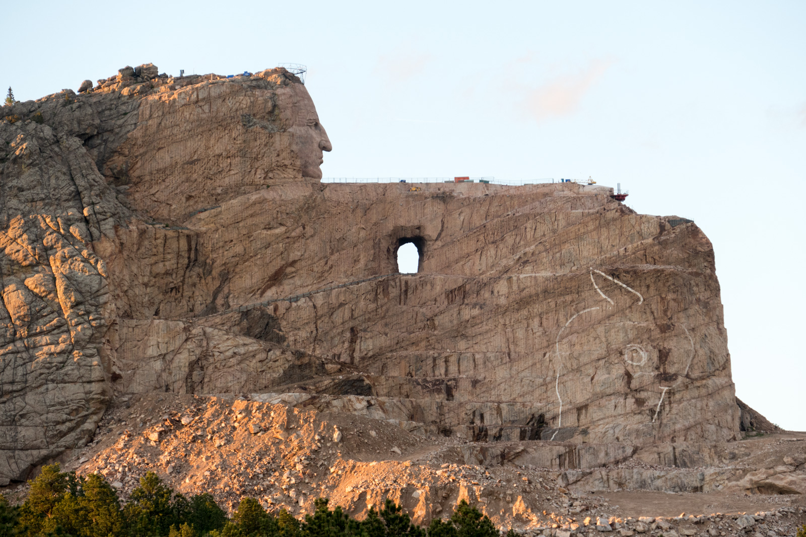 Note the drawings of the horse’s head on the mountain rock.