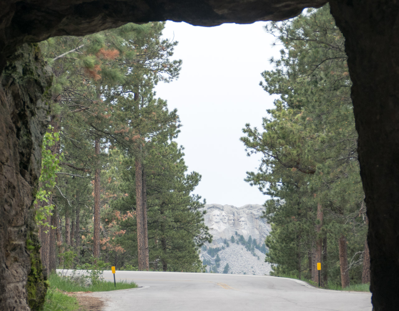 A tunnel on the Iron Mountain Road which frames Mt. Rushmore.