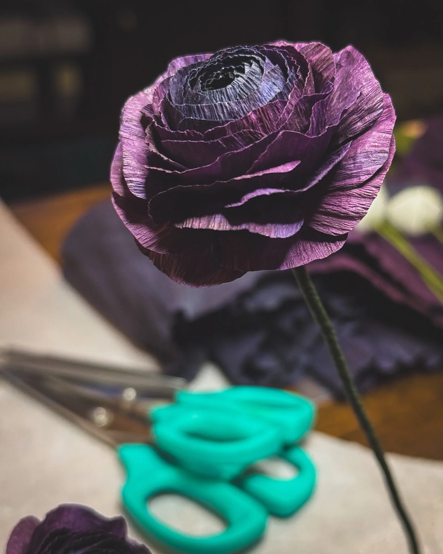 I&rsquo;ve been working on some moody little ranunculuses this week using some 180g Italian crepe paper I dyed last year. I bathed some black and magenta together and got some really lovely tones. I built up the center with what was black paper, and 
